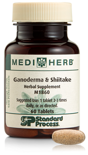 A bottle of Ganoderma & Shiitake herbal supplement next to a tablet.